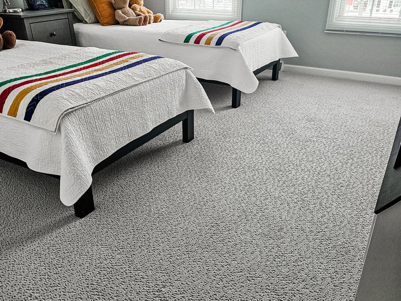 Grey carpet flooring by Absolute Floor Covering in Western Michigan area