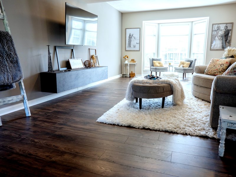 New Hardwood flooring in an open living room by Absolute Floor Covering