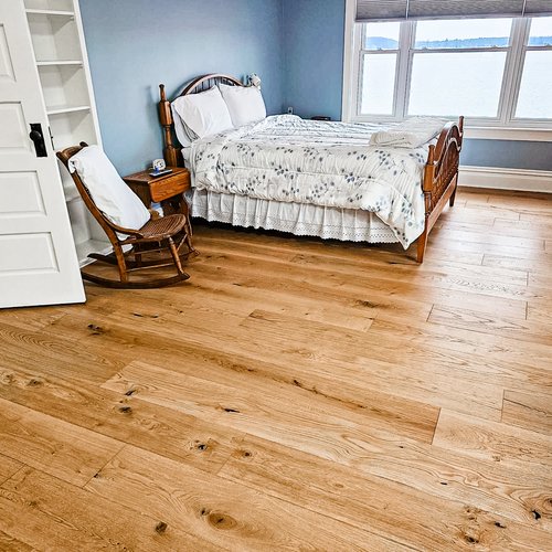 Bedroom hardwood flooring by Absolute Floor Covering Inc in Grand Rapids, MI
